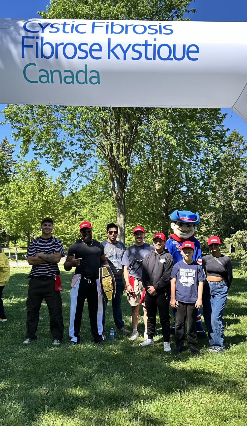 Fitz Vanderpool leading a team at the Cystic Fibrosis Canada Walk to Make Cystic Fibrosis History with the Kitchener Rangers mascot